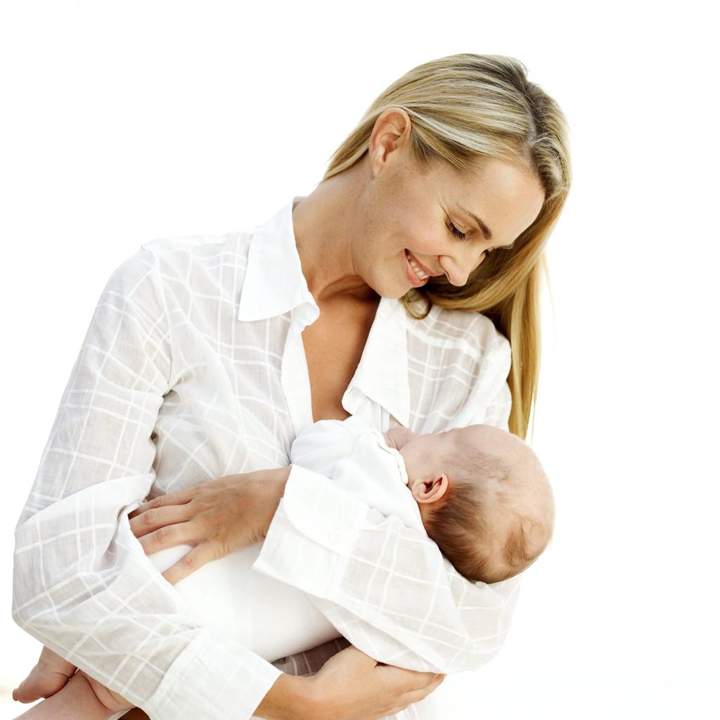 Baby Breast Feeding --- Image by © Royalty-Free/Corbis